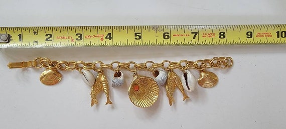 sea life pendant charm bracelet Pisces fish shells gold tone