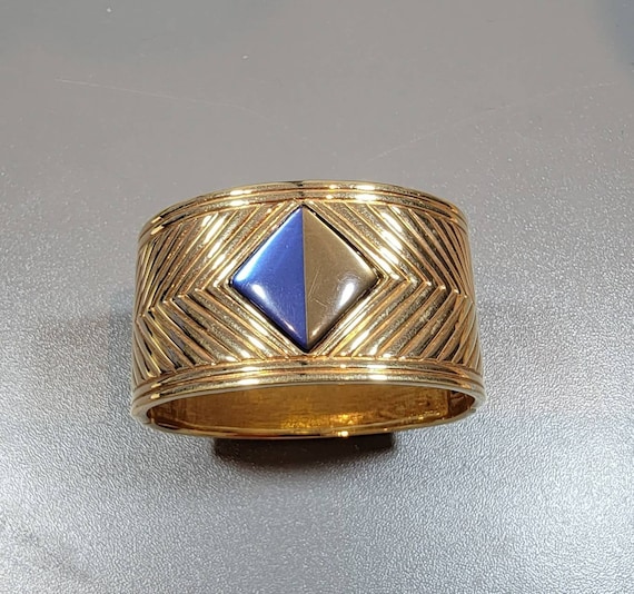 gold tone chunky bangle wide geometric design blue brown stone accent