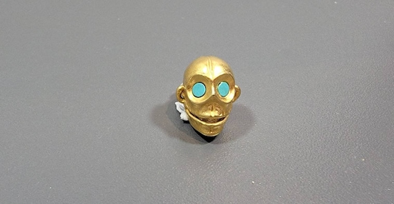 skull earring single pierced stud movable jaw Aztec design
