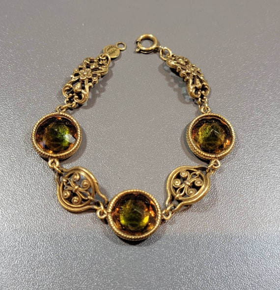 rhinestone bracelet large round stones bezel set gold tone metal