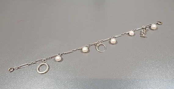 art deco charm bracelet sterling silver pearls phone wedding ring eternity ring