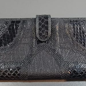 Cartera vintage de piel negra de carlos falchi