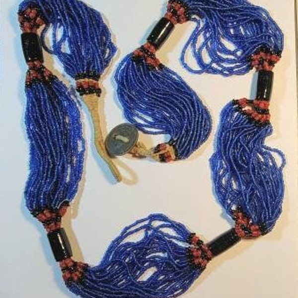 blue glass bead necklace Multi strand torsade red black antique coin clasp Nagaland India