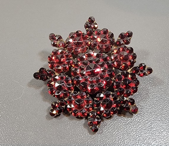 antique brooch faux garnets large floral design