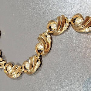 lisner rhinestone bracelet gold tone metal links rhinestone accents
