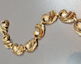 lisner rhinestone bracelet gold tone metal links rhinestone accents