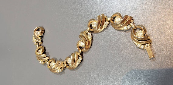 lisner rhinestone bracelet gold tone metal links rhinestone accents