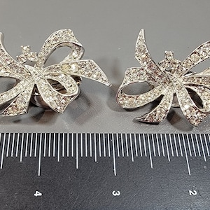 bow earrings Kenneth lane rhinestone pave silver tone clip on large