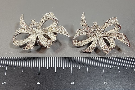 bow earrings Kenneth lane rhinestone pave silver tone clip on large