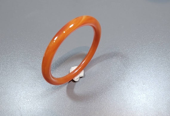 glass bangle bracelet warm color agate look a like or carnelian