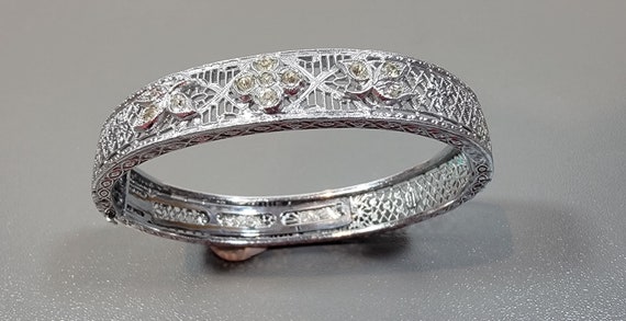 Filigree bracelet rhinestone stone accent Hinged bangle looks like platinum