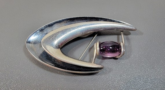 Sigi Taxco brooch sterling silver modernist boomerang amethyst cabochon