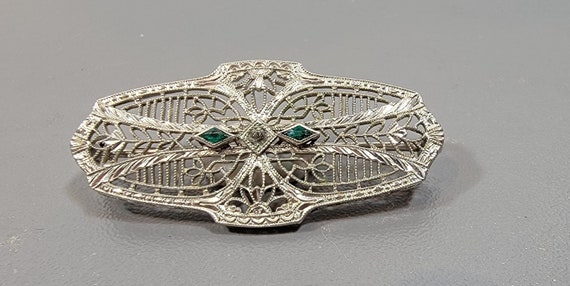 filigree brooch silver tone metal green rhinestones edwardian
