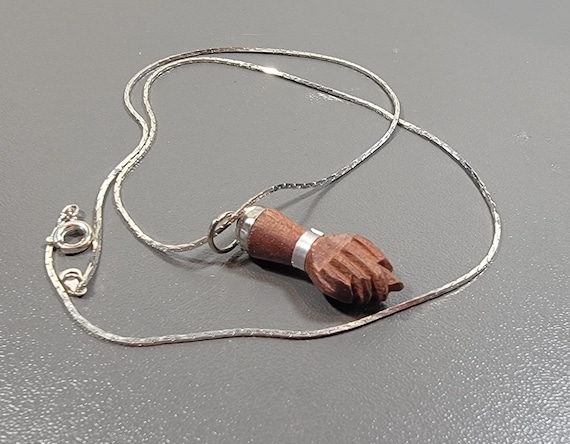 figa pendant necklace silvertone metal carved wood amulet evil eye
