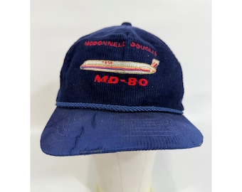 Cappello da aviatore vintage McDonnell Douglas MD-80 in velluto a coste blu navy, effetto invecchiato.