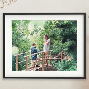 May include: Watercolour painting depicting a marriage proposal. A man kneels on a wooden bridge, offering a ring to a woman. The scene is set amidst verdant foliage, creating a romantic outdoor setting. The artwork is framed in a black border.