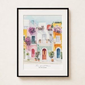 May include: Watercolor print of colorful buildings with flowers and doors. The buildings are painted in shades of yellow, pink, white, orange, and blue. The text "The first time" and the date "05.06.2022" are at the bottom of the print.