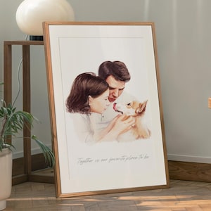 May include: A framed watercolour print showing a couple and a dog. The artwork is in a wooden frame and includes the text "Together is our favourite place to be". The print has a white border and is displayed indoors.