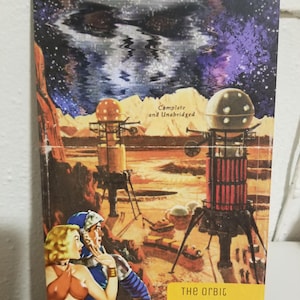 May include: A vintage science fiction zine cover featuring a retro space scene with a couple, futuristic structures, and a starry sky. The text reads "Complete and Unabridged" and "THE ORBIT DRIVE-IN zine issue 5".