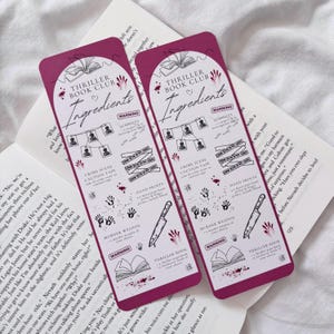 May include: Two pink bookmarks with a thriller book club theme. The bookmarks feature a list of "ingredients" for a mystery, including suspects, hand prints, a murder weapon, crime scene caution tape, and a thriller book. The bookmarks are decorated with red blood splatter.