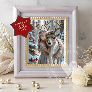 May include: A framed print featuring a young girl embracing a reindeer in a winter forest scene. The print has a gold border and is set in a white frame. The image includes the text "PERFECT FOR WALL ART" on a red star-shaped graphic.