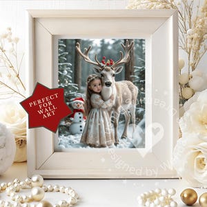 May include: A framed print featuring a young girl embracing a deer in a snowy forest. The deer wears a festive red and green antler decoration. A snowman is visible in the background. The frame is white, and a red star-shaped sticker reads "PERFECT FOR WALL ART."