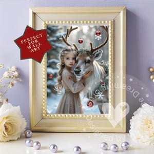 May include: A framed print featuring a young girl with long blonde hair and a reindeer. The image has a winter theme with red ornaments and a snowy background. The frame is gold with a pearl-like border. A red star-shaped tag reads "PERFECT FOR WALL ART."
