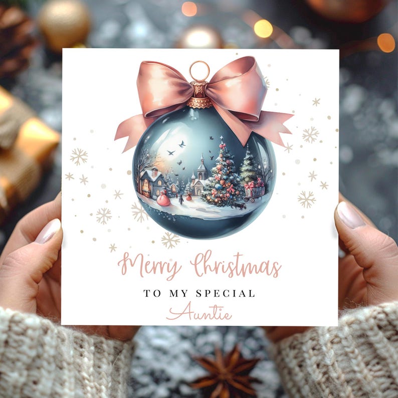 A very elegant Christmas card for Auntie, showcasing a very festive scene within a Christmas Bauble, Very sophisticated and elegant