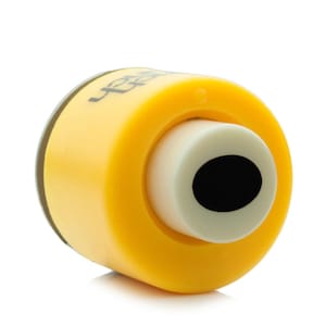 May include: A yellow and white paper punch tool with a black hole. The tool has a cylindrical shape with a rounded edge and a circular punch opening. The word "tech" is printed on the side.