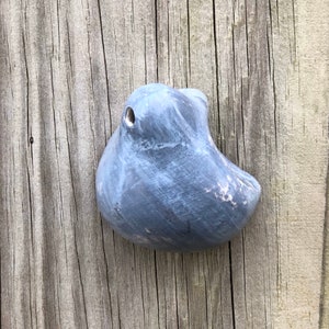 Gray ceramic wall pod sculpture