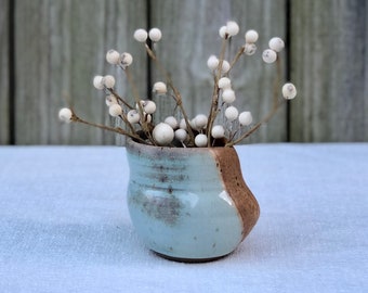 Ceramic cup handmade thrown and altered with sea foam green and brown glazes