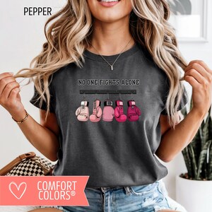 Breast Cancer Awareness Comfort Colors Shirt, No One Fights Alone Pink Ribbon Chemo Shirt, October Cancer Family Support Squad Tees