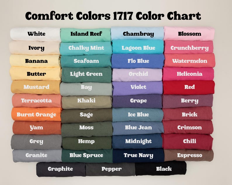 May include: A color chart titled "Comfort Colors 1717 Color Chart" displays a variety of fabric colors. The chart includes colors like white, ivory, banana, butter, mustard, terracotta, burnt orange, yam, grey, and granite.
