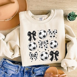 Coquette Soccer Sweatshirt — Bow and Ball Graphic Crewneck, Soccer Mom Gift, Aesthetic Game Day Shirt for Women 画像 1