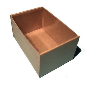 May include: A brown cardboard box with a clear plastic window on the top. The box is empty.
