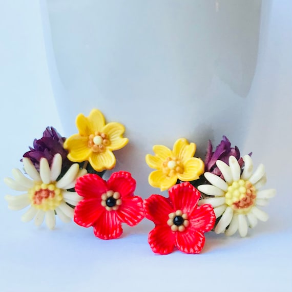 Vintage Multi-color Edelweiss Lucite Clip Earrings - image 1