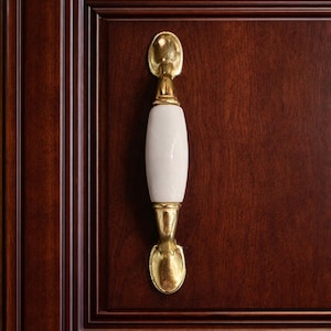 May include: A rustic wooden sign with the text "Welcome to our home" in a handwritten style. The sign features a distressed finish and a simple, inviting design, perfect for a front porch or entryway.