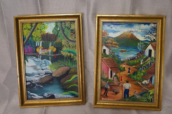 Pair of Latin American Signed Folk Art Oil Paintings Known Artists  Jungle Toucan and Village Waterfall Scenes