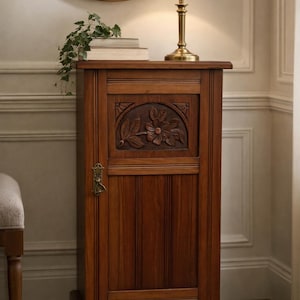 Eastlake solid walnut cabinet carved floral panel statement Spanish revival accent table vintage storage elegant home decor