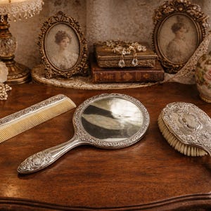 silver plated dressing table set Vintage Silver Plate Vanity Dresser Set Matching Hand Mirror Brush Comb Tray Raised Relief Scroll Floral Design Victorian Style Home Decor