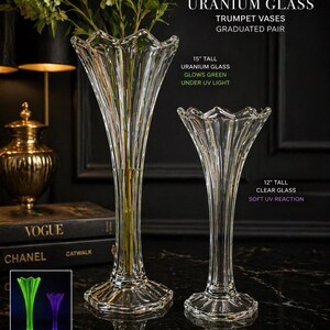 May include: A pair of vintage uranium glass trumpet vases. The taller vase is 15 inches tall and glows green under UV light. The smaller vase is 12 inches tall. The image includes the text "VINTAGE URANIUM GLASS TRUMPET VASES GRADUATED PAIR."