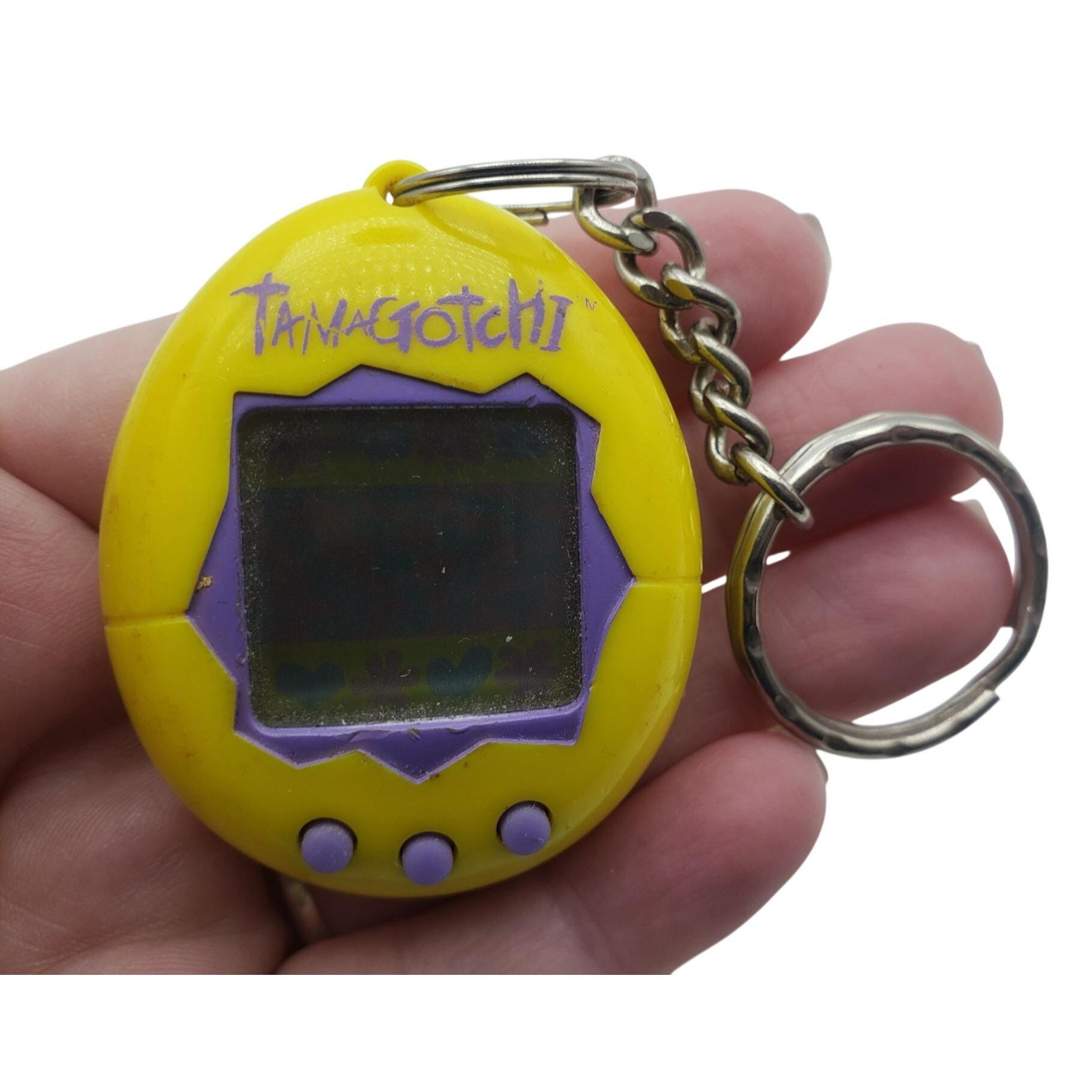 Bandai Tamagotchi Keychain Yellow Electronic Pet Toy 1997 Vintage