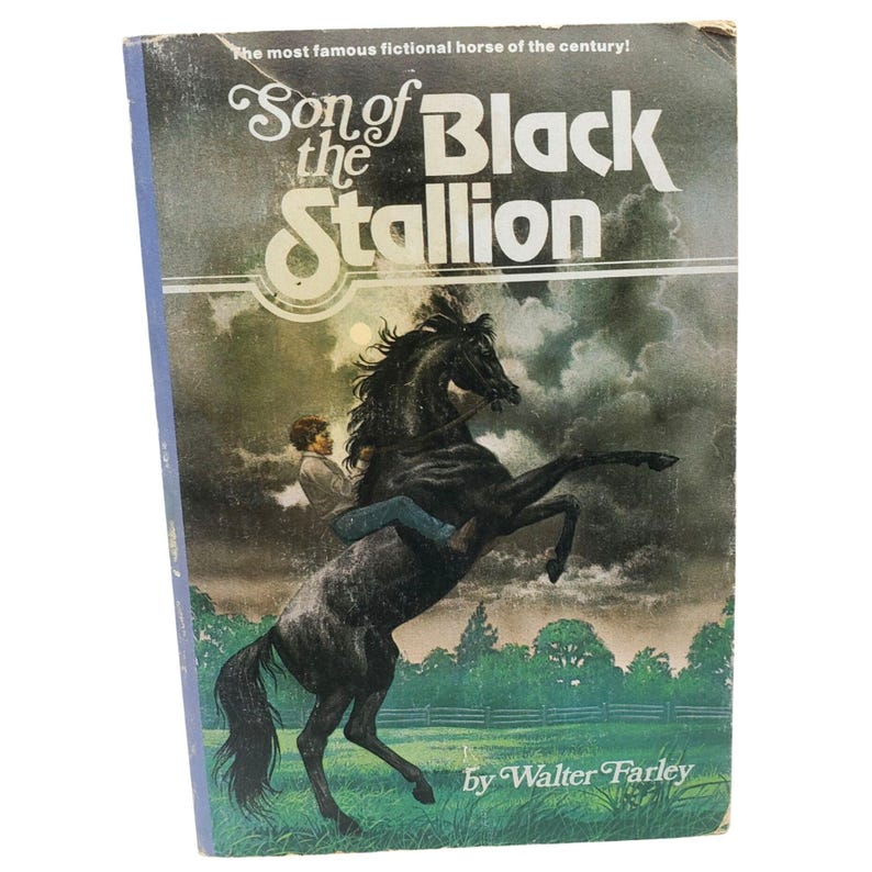 May include: Vintage book cover for "Son of the Black Stallion" by Walter Farley. The cover features a black horse rearing up with a rider, set against a cloudy sky and green landscape. Text includes the title and author's name.