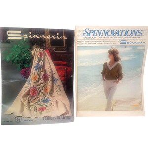 May include: Two vintage craft booklets. The left booklet is titled Spinnerin Fashions in Living Volume 188, featuring a cream-colored fabric with colorful floral embroidery. The right booklet is titled 12 Spinnovations Idea Book 44 Fabulous Looks for Summer.
