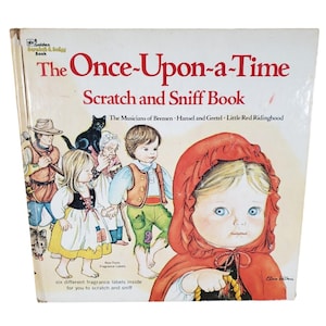 May include: Vintage "The Once-Upon-a-Time Scratch and Sniff Book" with illustrations of fairy tale characters. The cover features a red-hooded girl, and the book promises six different fragrance labels inside. A classic children's book.