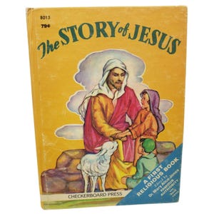 May include: Vintage children's book titled "The Story of Jesus." The cover features an illustration of Jesus with two children and a lamb, set against a yellow background. The book is published by Checkerboard Press.