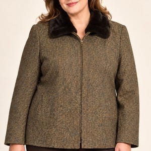 May include: A long-sleeved jacket featuring a brown and olive green herringbone pattern, a full-length centre front zip fastening, and a dark brown faux fur collar. The jacket has a straight hemline and long sleeves with a structured fit.