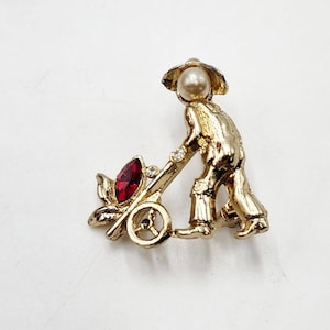 Vintage 40er Jahre Coro Man Faux Perlenkopf mit Blumenwagen Pin Brosche Farmer