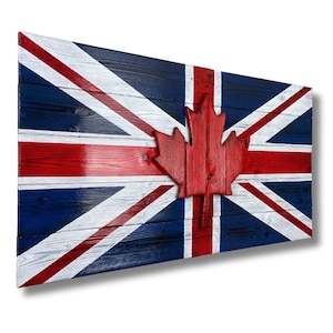 May include: A wooden wall art piece depicting the Union Jack flag with a red maple leaf in the center. The flag is painted in red, white, and blue.