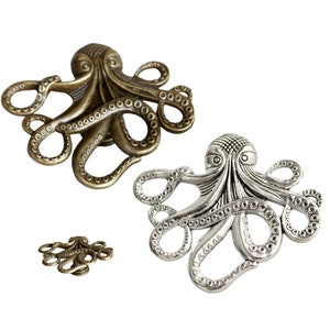 May include: Two octopus-shaped drawer pulls, one in silver and one in bronze. The octopus has eight tentacles with textured details.